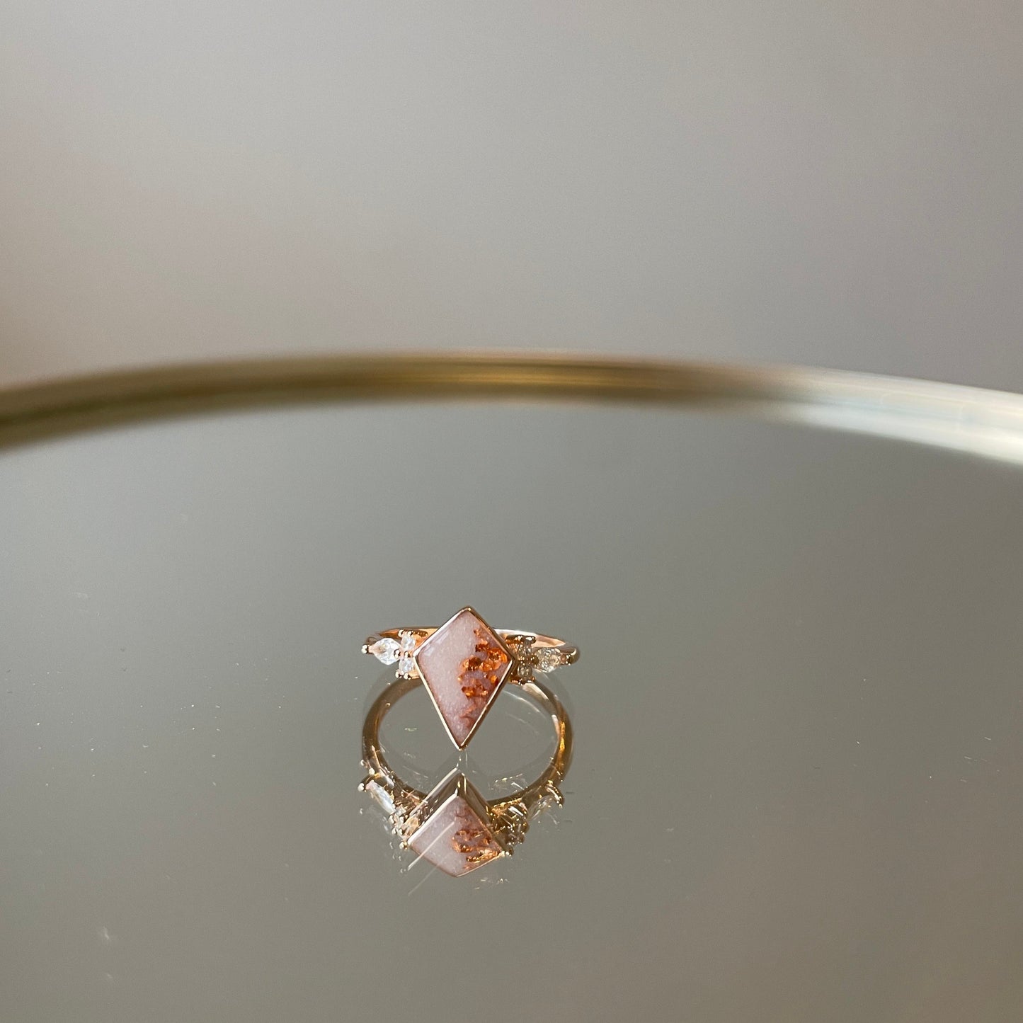 moedermelk ring zegel vorm borstvoeding sieraad
